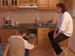 Mommy catches in kitchen