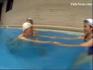 Slim youth In Swimming Cap Getting Kiss Of Life pecker Jerked By 3 Girls Licking Pussies Nearby The Swimming Pool